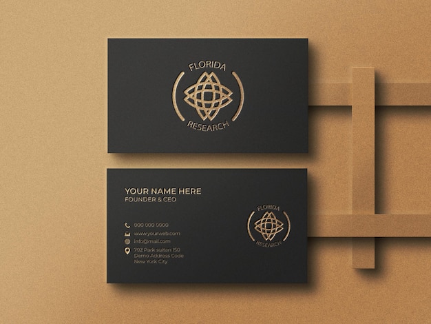 Logo mockup on business card with pressed gold print effect