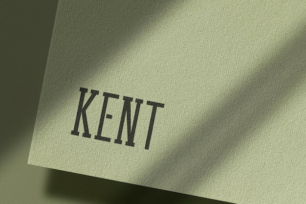 PSD logo mockup on green paper