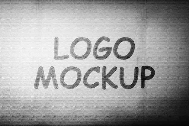 Logo mockup on white wall