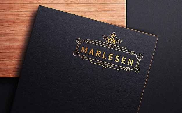 Luxury debossed logo mockup on black craft paper