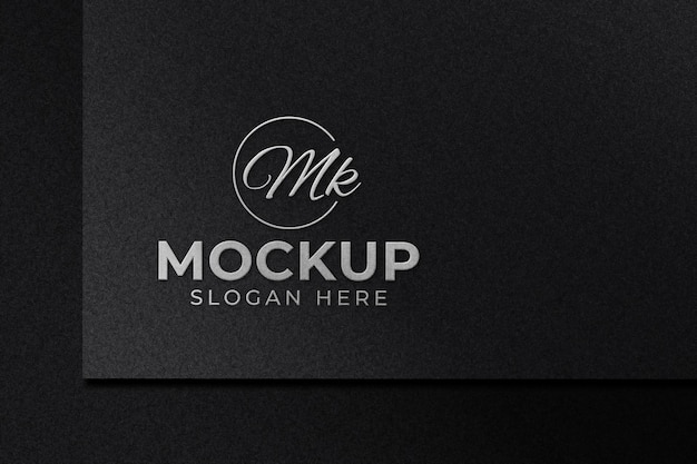 Luxury embossed silver logo mockup on black paper