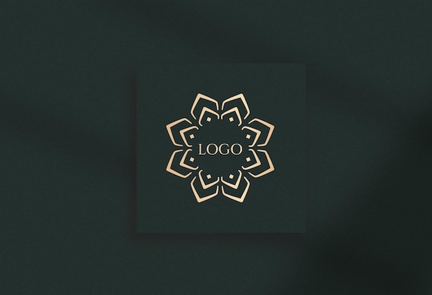 PSD luxury mockup on green paper with golden color logo