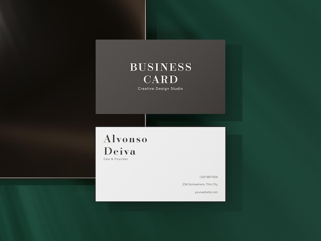 Luxury top view business card mockup with dark green background