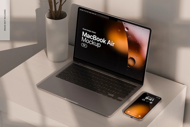 PSD macbook air and iphone pro with sunset light mockup