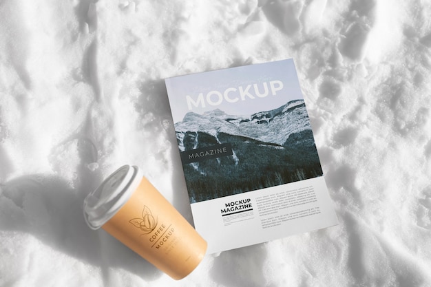 Magazine mockup on snow rock