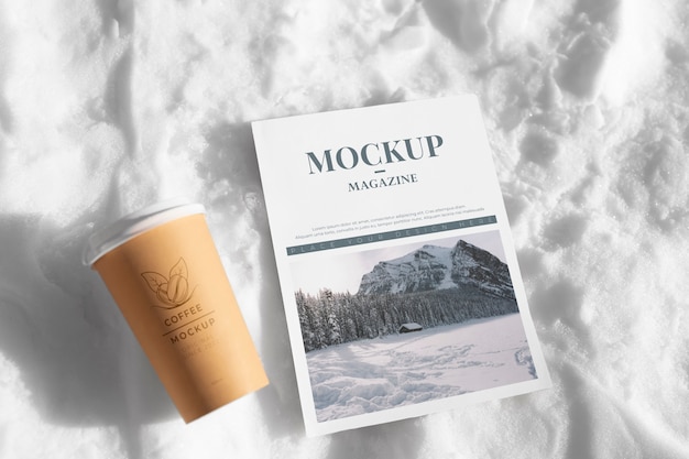 PSD magazine mockup on snow rock