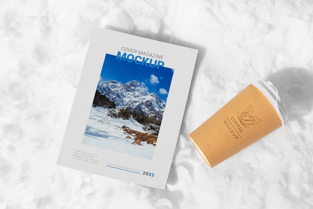 PSD magazine mockup on snow rock