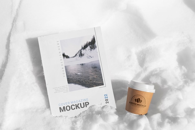 PSD magazine mockup on snow rock