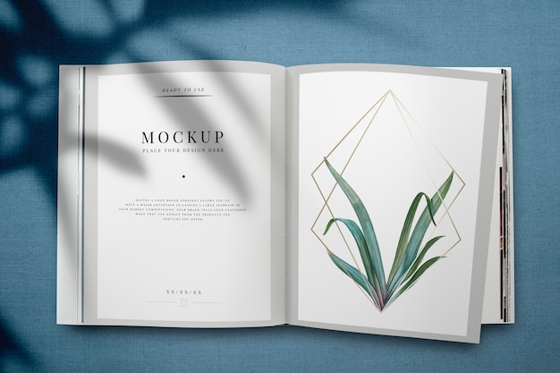 PSD magazine mockup with leaves and golden frame