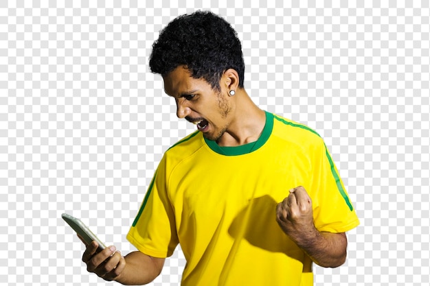 Male athlete or fan in yellow uniform looking cell phone isolated