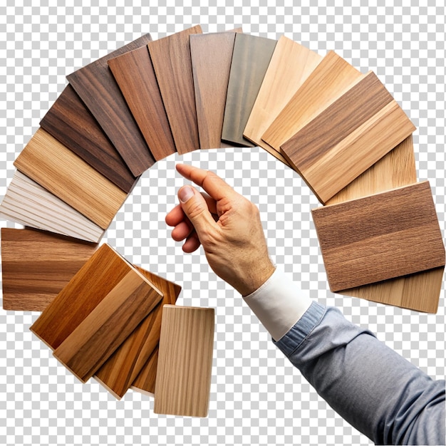 PSD male hand choosing sample of wooden panel for furniture on transparent