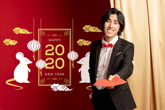 Man holding greeting cards for new year