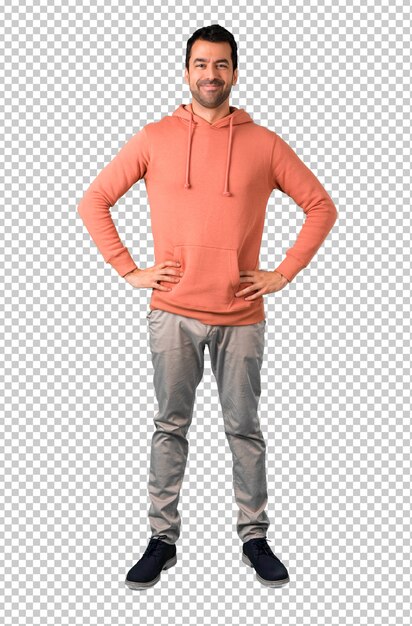 PSD man in a pink sweatshirt posing with arms at hip