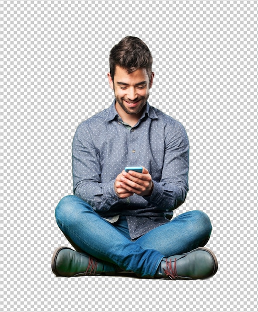 Man sitting on the floor amazed with mobile