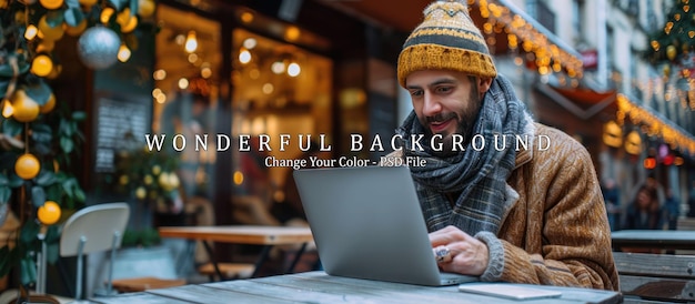 PSD man typing on laptop in a festive outdoor setting