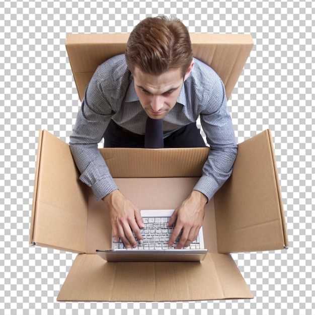 Man using laptop by boxes at home