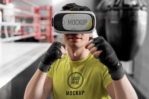 Man using virtual reality goggles at boxing training