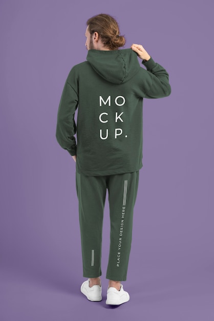 Man wearing jogger pants and hoodie mockup