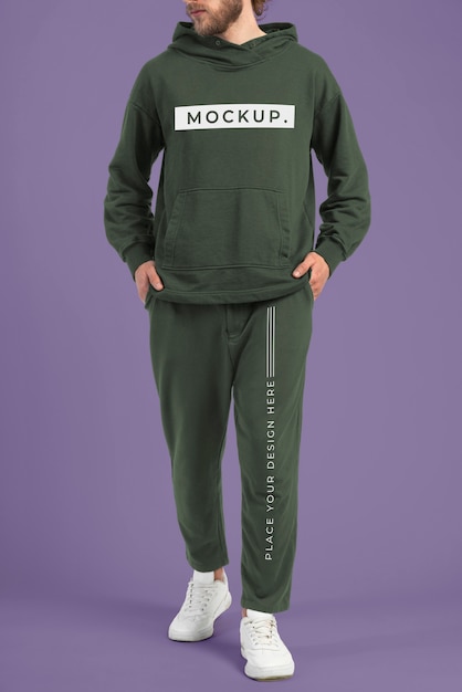 Man wearing jogger pants and hoodie mockup