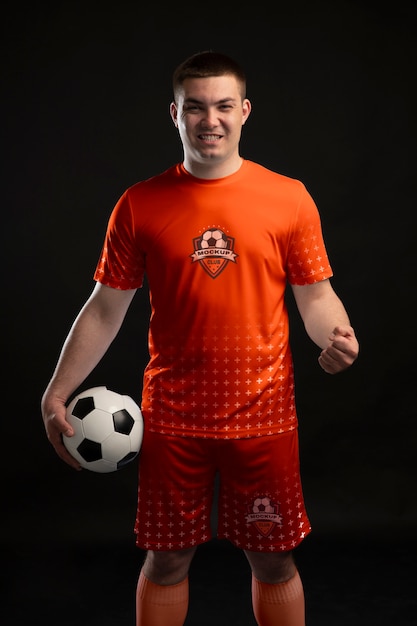 Man wearing soccer equipment front view