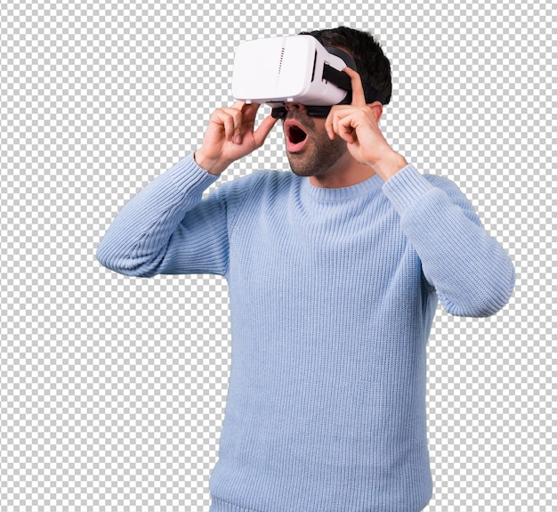 PSD man with blue sweater using vr glasses. virtual reality experience