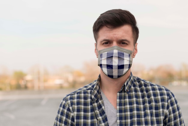 Man with fabric mask on face