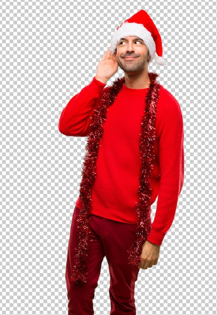 PSD man with red clothes celebrating the christmas holidays listening to something 