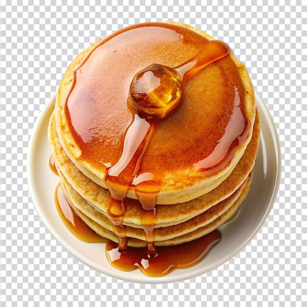 PSD maple syrup poured over fluffy pancakes isolated on transparent background