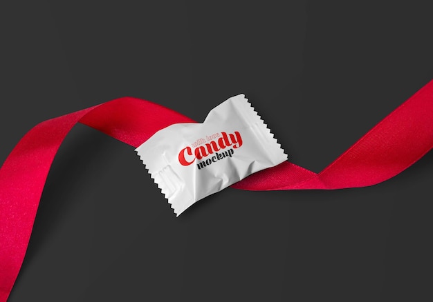 PSD matte candy with red ribbon mockup