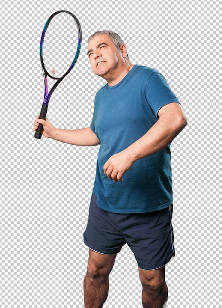 Mature man playing with a racket