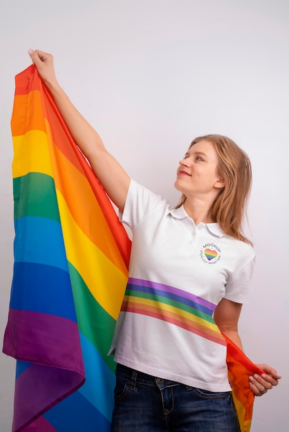 PSD medium shot woman holding pride flag