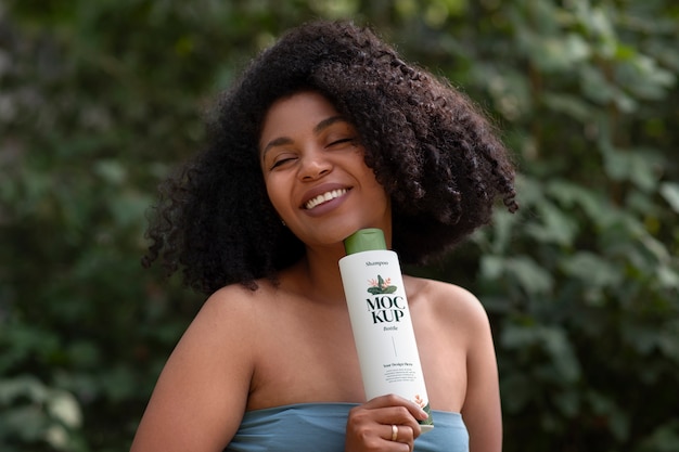 PSD medium shot woman using curly hair shampoo