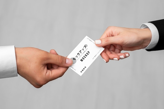 Men holding a business card mock-up