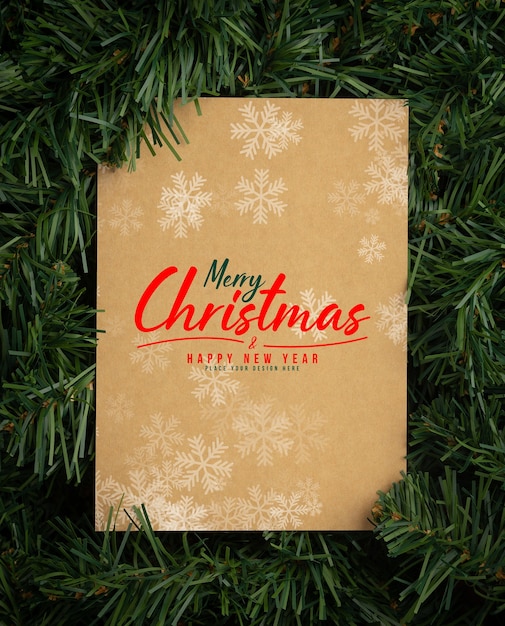 Merry Christmas paper note mockup with pine leaves decorations