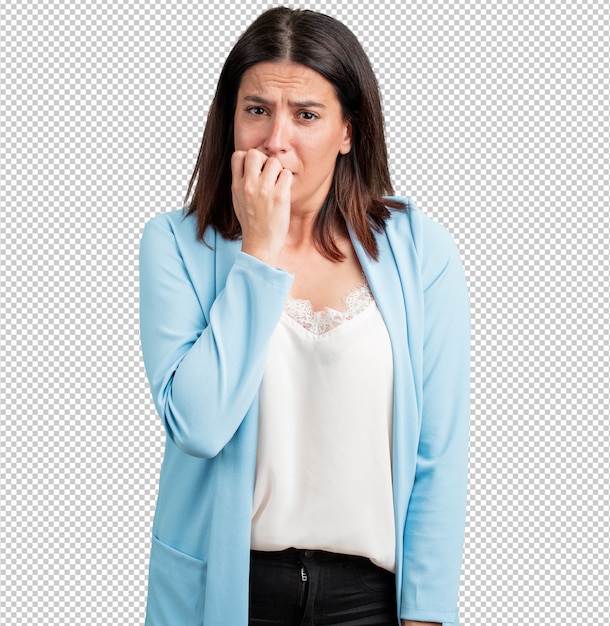 Middle aged woman biting nails, nervous and very anxious and scared for the future, feels panic and stress