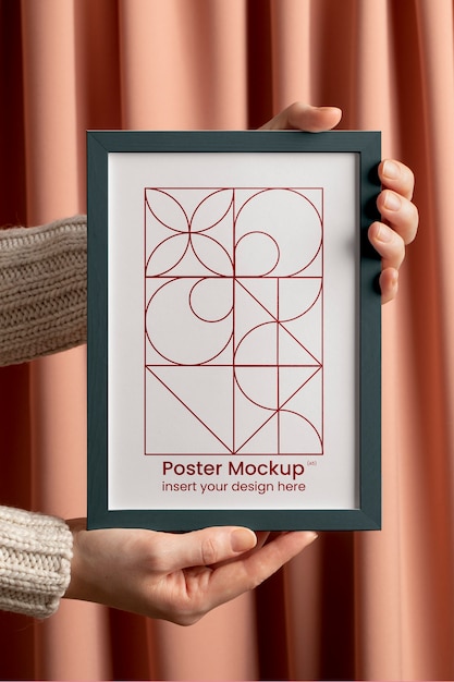 Minimal frame mockup held in hands