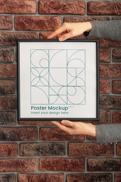 Minimal frame mockup held in hands