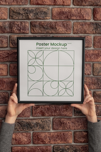 Minimal frame mockup held in hands