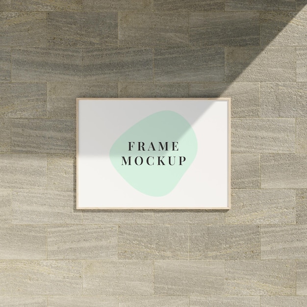 Minimal frame mockup on the marble brick wall