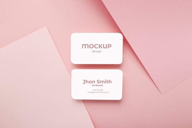 Minimalist business card mockup composition on geometric background with pink and white colors