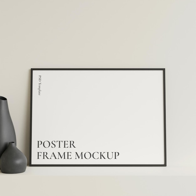 Minimalist front view horizontal black photo or poster frame mockup leaning against wall on table with vase 3d rendering