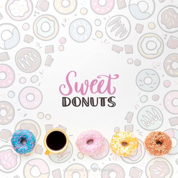 Mix of colorful donuts and coffee with mock-up