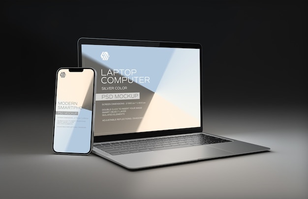 PSD mobile phone and laptop isolated on black mockup