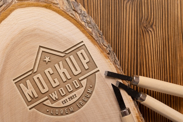 Mock-up logo with engraved effect on wood and tools