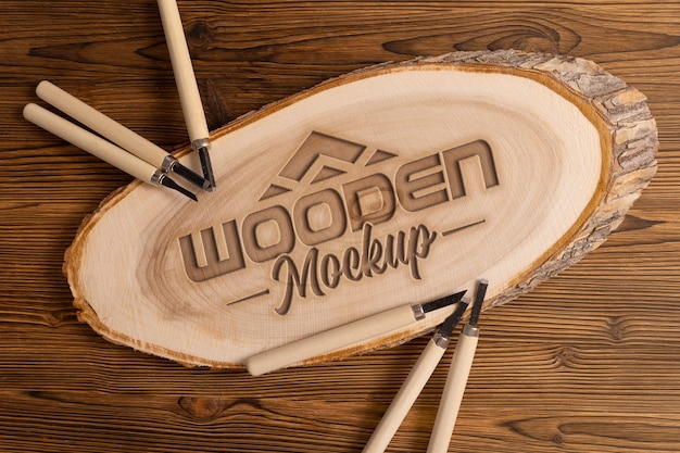 Mock-up logo with engraved effect on wood and tools