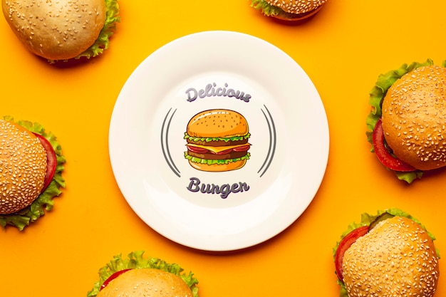 Mock-up plate surrounded by delicious burgers