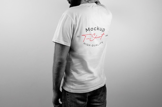 Mockup of black and white model wearing white tshirt