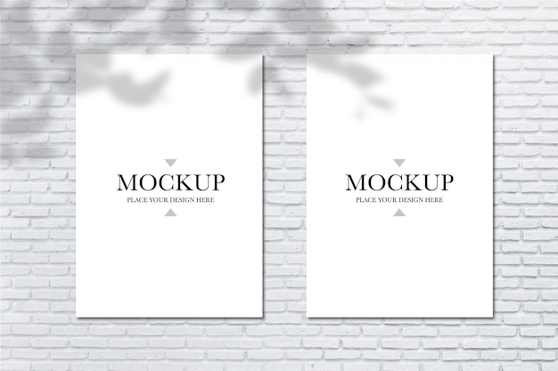 Mockup blank posters on brick wall