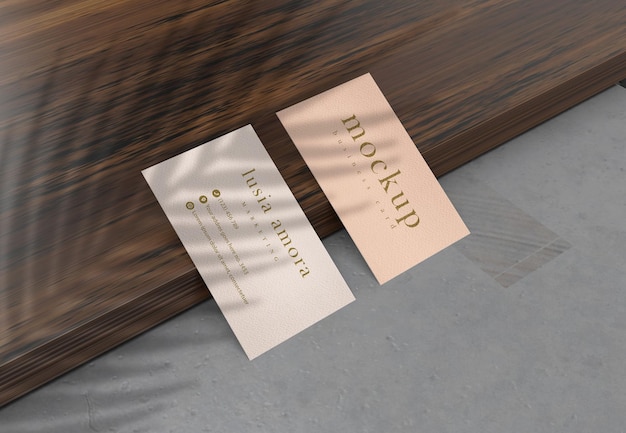 Mockup business card design on wood