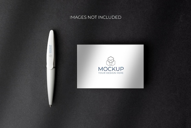 Mockup of a business card and a pen on an elegant black textured background with shadows